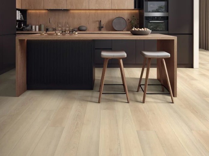 Light grey and brown Mohawk LVP floors provide style and durability for a modern bathroom.
